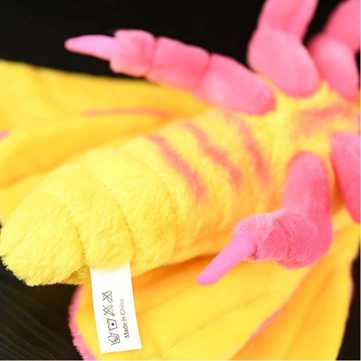 Rosy maple moth plush, close-up